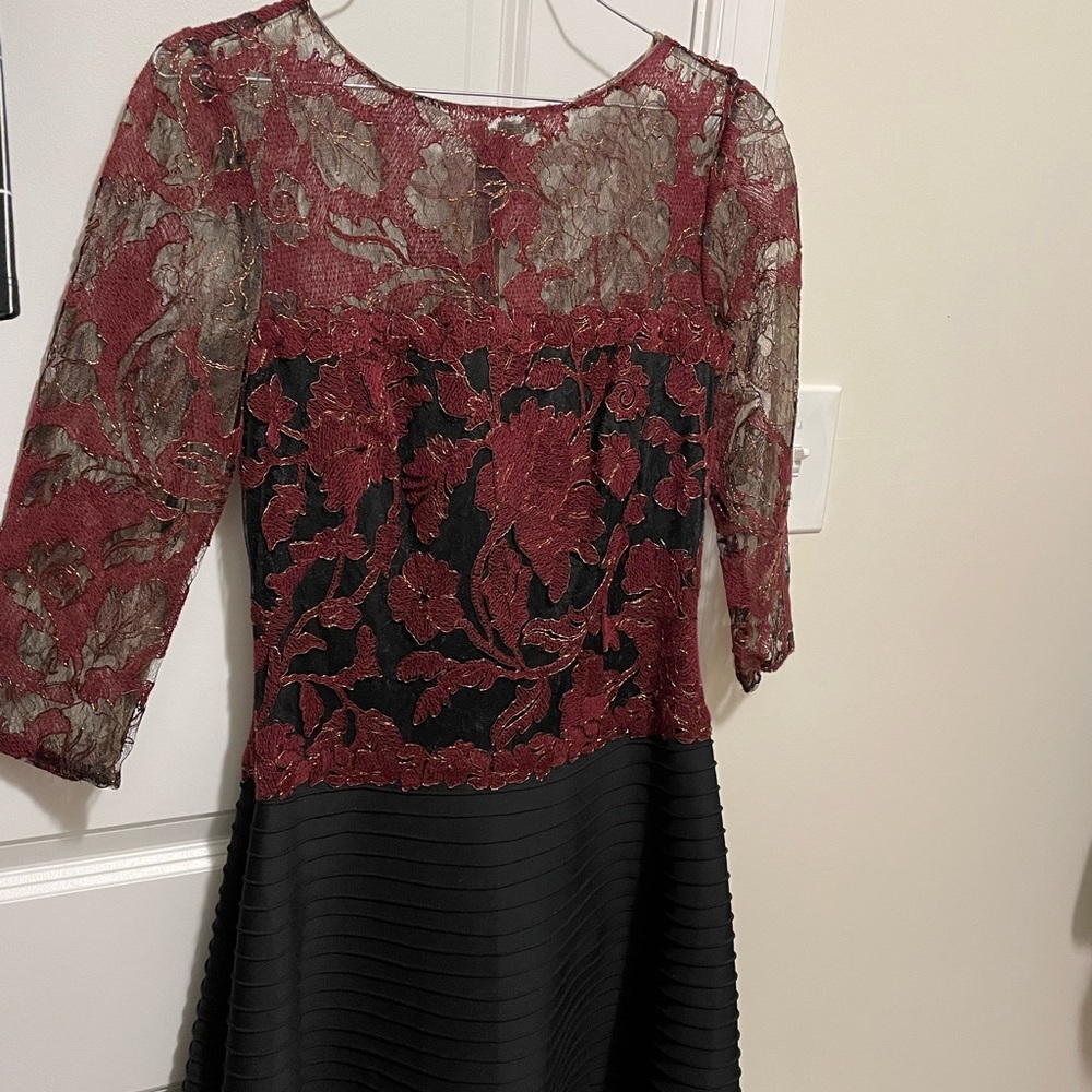 Midi dress from Tadashi shoji. Size 2( US size) never worn but no tags on it